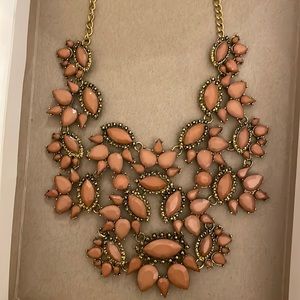 Costume jewelry, gold metal and mauve stone with geometric shapes